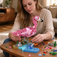 Jeu de construction flamant rose 287 pièces avec modèle vibrant en lego rose sur base bleue pour construction flamant rose