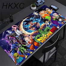 Tapis de souris grand format manga maîtres des arts martiaux avec design galactique vibrant et personnages dynamiques