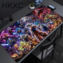 Tapis de souris grand format manga maîtres des arts martiaux avec scène dynamique super saiyan sur fond cosmique