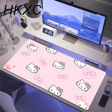 Tapis de souris grand format rose avec motif petit chat kawaii hello kitty en répétition