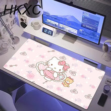 Tapis de souris grand format petit chat kawaii rose en peluche avec hello kitty en robe et nœud rose