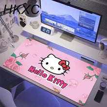 Tapis de souris grand format petit chat kawaii rose avec visage de chat blanc, nœud rouge et motif floral