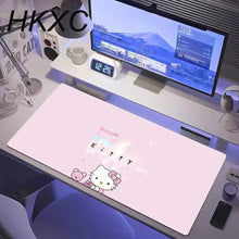 Tapis de souris grand format petit chat kawaii rose avec finition mate douce et accents pailletés subtils