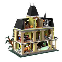 Jeu de construction maison hantée victorienne trois étages jaune avec toit pointu noir 1707 pièces