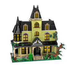 Jeu de construction maison hantée victorienne jaune avec toit noir fenêtres cintrées et lierre vert 1707 pièces