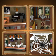 Jeu de construction manoir hanté avec toile de araignée blanche en plastique et araignée noire en plastique comme pièce centrale