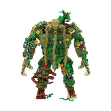 Lego construction monstre des marais à l’allure fantastique vert et marron avec vignes fleurs et branches
