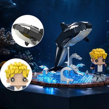 Jeu de construction orque 758 pièces avec orque noir et blanc et personnage blond dans un monde marin bleu
