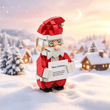 Jeu de construction personnage de Noël portant une pancarte merry Christmas en plastique ABS rouge et blanc 301 pièces