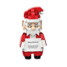 Jeu de construction personnage de noël portant un père noël en plastique abs rouge et blanc avec pancarte merry christmas