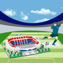 Modèle terminé de construction stade de football en briques plastiques colorées avec sièges rouges et bleus notice d’assemblage incluse