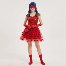 Déguisement princesse ladybug miraculous avec corsage rouge à sequins et pois noirs et jupe en tulle assortie sac à bandoulière