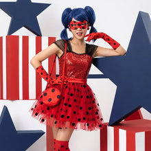 Déguisement princesse ladybug miraculous robe rouge en tulle à pois noirs avec corsage sequins et manches en tulle noir sac à bandoulière