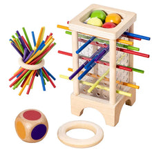 Jeux d’équilibre avec bâtonnets en bois colorés, balles et anneaux, disponible dans magasins de jouets pour déguisement carnaval