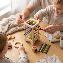 Jeu d’équilibre avec bâtonnets en bois colorés et boules pour magasins de jouets et déguisement carnaval