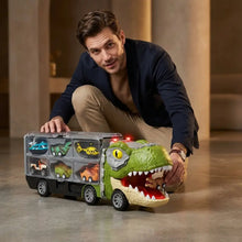 Camion transporteur dinosaure vert avec espace cargo transparent contenant mini voitures dinosaures et lumière rouge