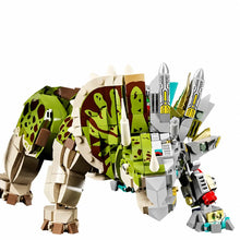 Dinosaure articulé à construire en lego vert et marron avec plaques métalliques et détails mécaniques dorés idéal magasins de jouets