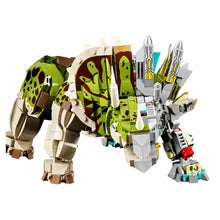 Dinosaure articulé à construire en lego vert et marron avec accents mécaniques argent, or et blanc disponible en magasins de jouets