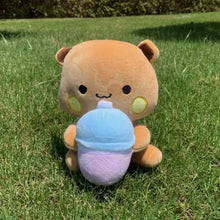 Peluche ours tan tenant une glace pastel bleue et violette dans duo de peluches panda et ours 20 cm cadeau tendre