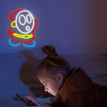 Enseigne néon led shy guy avec alimentation usb en forme de personnage kirby lumineux avec accents jaunes et pieds bleus