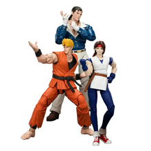Figurines équipe arts martiaux 1 18 avec trois figurines détaillées en poses de combat dynamique et tenues colorées