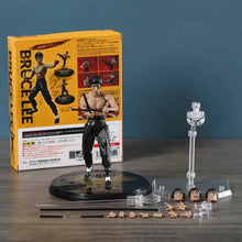 Figurine bruce lee legacy 50th noire et blanche en pose d’arts martiaux dynamique avec pièces interchangeables