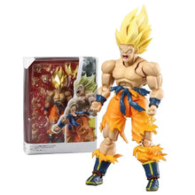 Figurine dragon ball z super saiyan goku avec cheveux dorés et pantalon orange pour collection et exposition