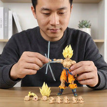 Figurine dragon ball z super saiyan goku avec cheveux jaunes en plastique articulé portant pantalon orange et ceinture bleue