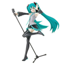 Figurine hatsune miku projet diva 15thver avec cheveux bleu-vert longs tenue noir et gris tenant un micro sur pied