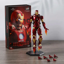 Figurine marvel iron man mark en métal rouge et or avec articulations, posée sur base hexagonale noire