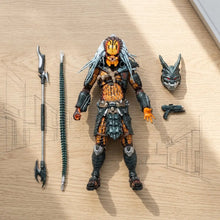 Figurine predator clan leader avec armure orange et noire, dreadlocks argentés et marques tribales détaillées sur le casque