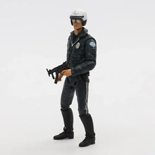 Figurine terminator 2 judgment day articulée en plastique noir d un policier en uniforme avec casque blanc et fusil d assaut
