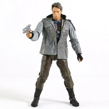 Figurine terminator t-800 en gris et marron avec veste détaillée et pistolet argenté en main