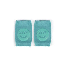 Genouillères souples pour bébé 8 × 11 cm en maille teal avec design smiley idéal pour déguisement carnaval