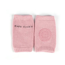 Genouillères souples pour bébé roses en tricot avec patch antidérapant circulaire et broderie kids socks, dimensions annoncées 8 × 11 cm
