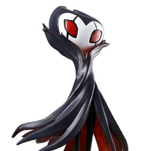 Figurine hollow knight grimm 20 cm en noir et blanc avec yeux rouges lumineux et socle doré dans boîte illustrée