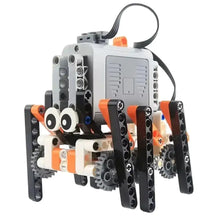 Robot spider construction gris noir et orange avec jambes articulées et mouvement par engrenages jeu construction robot spider electrique