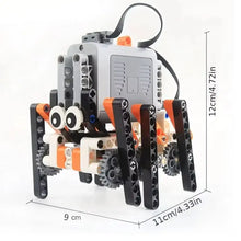 Robot spider gris et orange avec engrenages visibles et yeux blancs pour jeu construction robot spider electrique