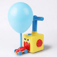 Jouet ballon en plastique jaune avec accents rouges et bleus, visage cartoon et ballon à air bleu clair à air comprimé
