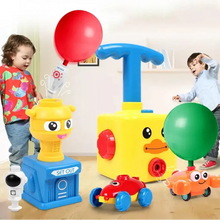 Jouet ballon en forme de canard jaune avec poignée bleue et boutons rouges pour usage à air comprimé enfant