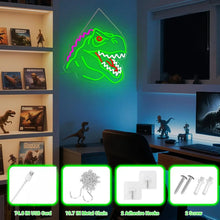 Lampe néon dinosaure t-rex avec tête verte lumineuse, yeux rouges et ligne rose en zigzag suspendue par chaîne