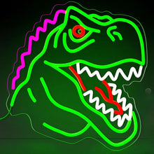 Lampe néon dinosaure t-rex avec contours verts lumineux, motifs roses en zigzag et accents rouges pour yeux et dents