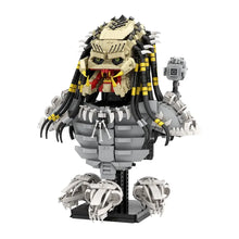 Lego moc alien predator figure with beige black body gray armor yellow striped dreadlocks and red face accents