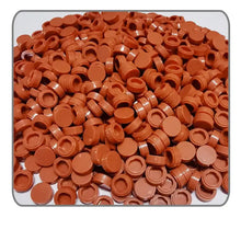 Une pile de capuchons de briques lego moc carrelage en plastique terracotta pour moc carrelage 1000pcs