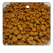 Une pile de capuchons en plastique tan pour lego moc carrelage 1000pcs combinant fonctionnalité et couleur