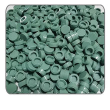 A pile of green plastic lego moc carrelage brick caps for customizable building in the 1000pcs set