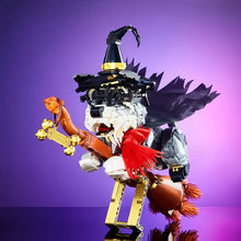 Figure lego moc chien magique harry potter avec chapeau noir écharpe rouge corps gris guitare orange ornée de grelots dorés