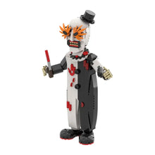 Lego moc clown terrifier menacing figure with white and black body, orange spiky hair, red accents, top hat, and knife