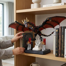 Lego moc dragon de flammes du trésor game of thrones modèle noir et rouge avec accents dorés sur trône blanc