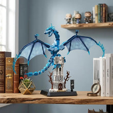 Lego moc dragon de glace bleu avec ailes translucides perché sur une tour en pierre blanche jeu de trônes